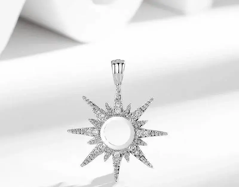 Sun-shaped silver-tone pendant setting, ready for a personal keepsake